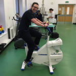 Woman trying out a new Monark rehab bike placed at the physiotherapy gym in the Royal Blackburn Hospital.