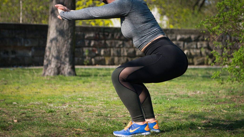 Women working out in park