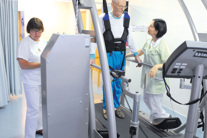 man walking on treadmill for rehab