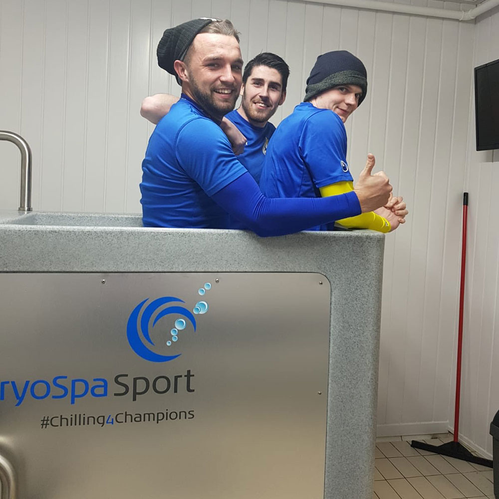 three men in cryospa sport ice bath