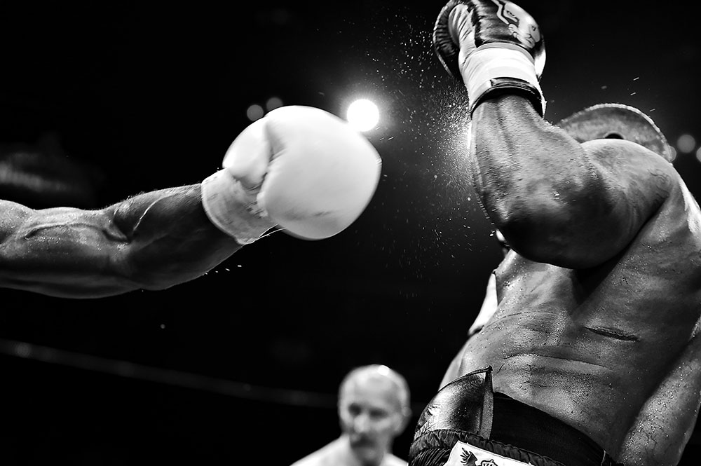 sweating boxers sparring