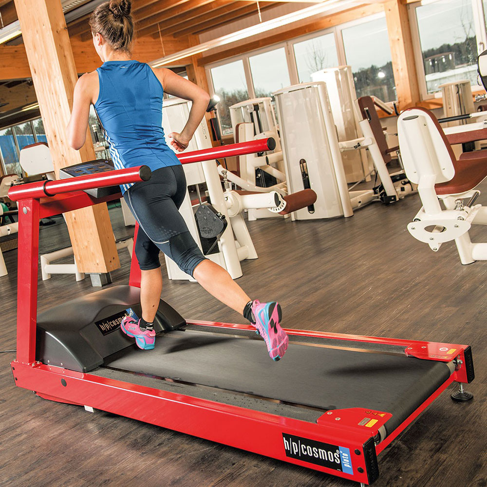 woman running on treadmill